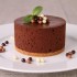 Dolce cheesecake al cioccolato con praline croccanti